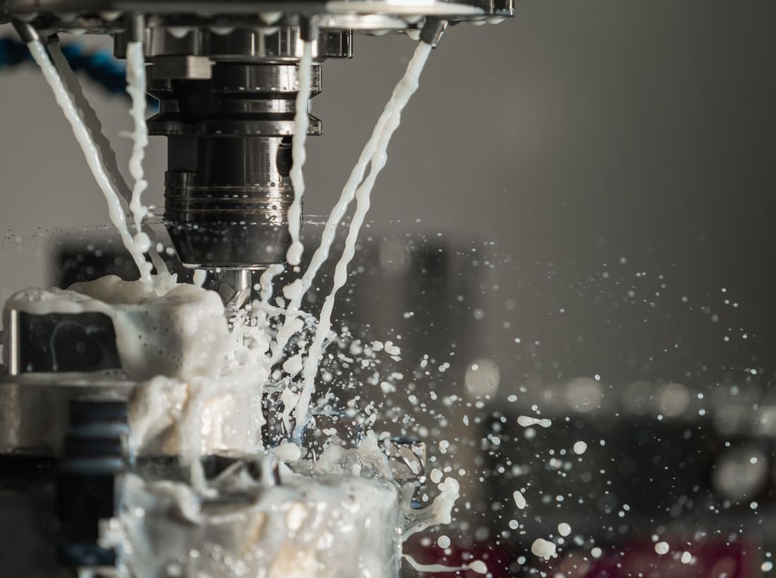CNC machining with coolant during a metalwork operation