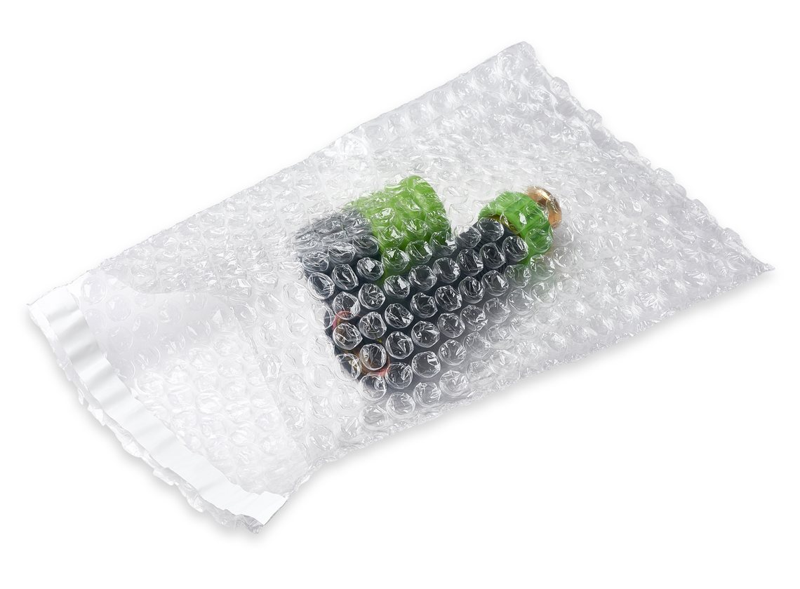 Poly and kraft bubble-lined cushioned mailers